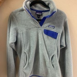 Women’s Patagonia half button pullover.
